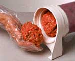 Load the sausage or meat into the stuffer.  The water stuffer will hold 9 lbs. of sausage or meat.